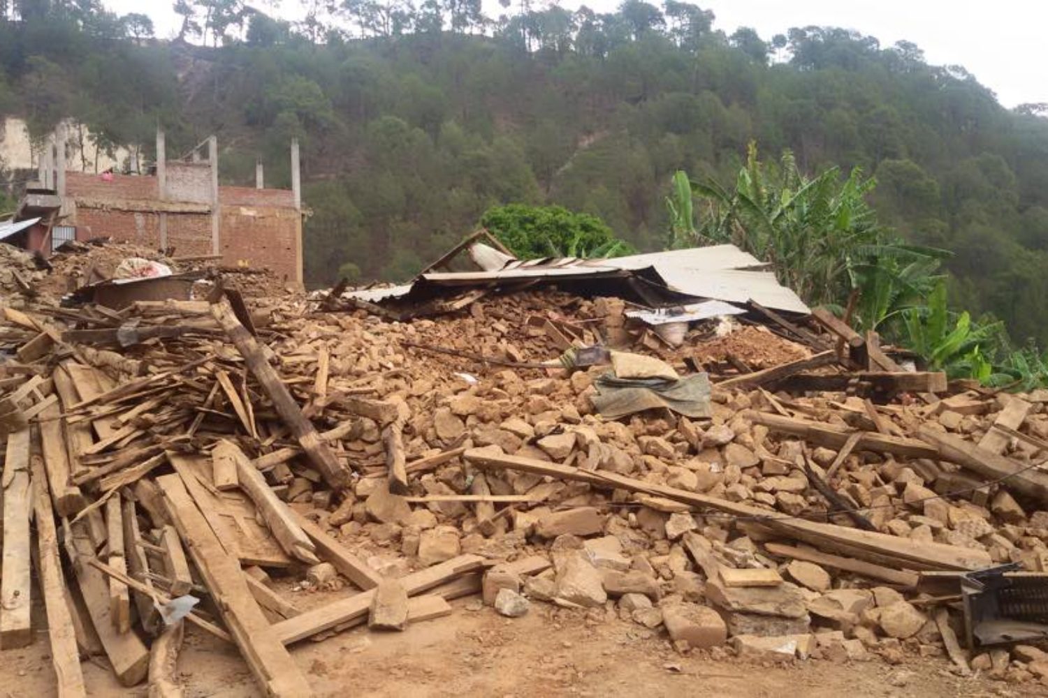 Rubble of a collapsed home in India