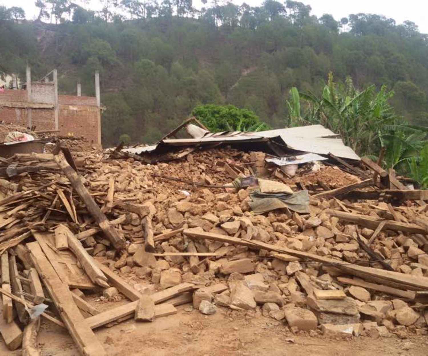 Rubble of a collapsed home in India